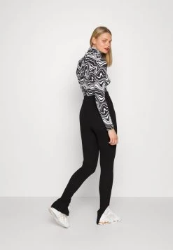 Vendita calda 💯 Karl Kani RETRO SLIT - Leggings - Black, Donna ✨ -Sconto Karl Kani in Italia 0eacde8b63964c95888b220c38b4cb21