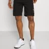 A buon mercato 🎉 Karl Kani UNISEX - Shorts - Black ⭐ -Sconto Karl Kani in Italia 137b821e60344808805715ce764ee20f