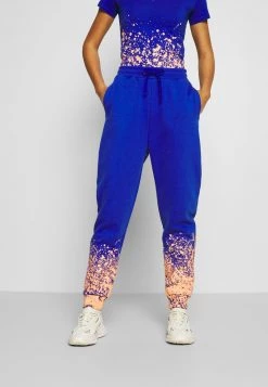 Buono 👏 Karl Kani SIGNATURE PAINT SPLATTER - Pantaloni Sportivi - Blue, Donna ✨