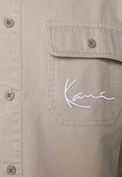 Presa 😉 Karl Kani UNISEX CHEST SIGNATURE - Giacca Da Mezza Stagione - Taupe ⭐ -Sconto Karl Kani in Italia 1efa19d4661d46a2876c725813ecced2