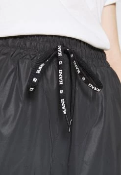 Offerte 🛒 Karl Kani RETRO REFLECTIVE TRACKPANTS - Pantaloni Sportivi - Black, Donna 🤩 -Sconto Karl Kani in Italia 20342e9159aa4d44ba09a92aa120f6c4