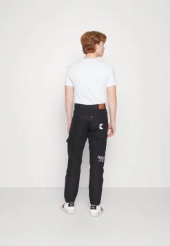 Sconto ⌛ Karl Kani RETRO RINSED PANTS UNISEX - 👖 Jeans Baggy - Black 🥰 -Sconto Karl Kani in Italia 2e4e7ddf3b7b431aa21e2e0b0a41d42b