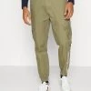 Buono βοΈ Karl Kani RETRO WASHED PANTS - Pantaloni Cargo - Dark Green, Uomo π₯ 2 Buono βοΈ Karl Kani RETRO WASHED PANTS - Pantaloni Cargo - Dark Green, Uomo π₯ -Sconto Karl Kani in Italia 344b144233d240dab0336f81d10b5c9d
