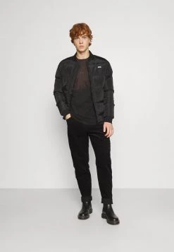 Migliore vendita 🎁 Karl Kani UNISEX RETRO PANTS - Pantaloni - Black 👏 -Sconto Karl Kani in Italia 424dd17d2ca544f9879ab19c1d4a2029