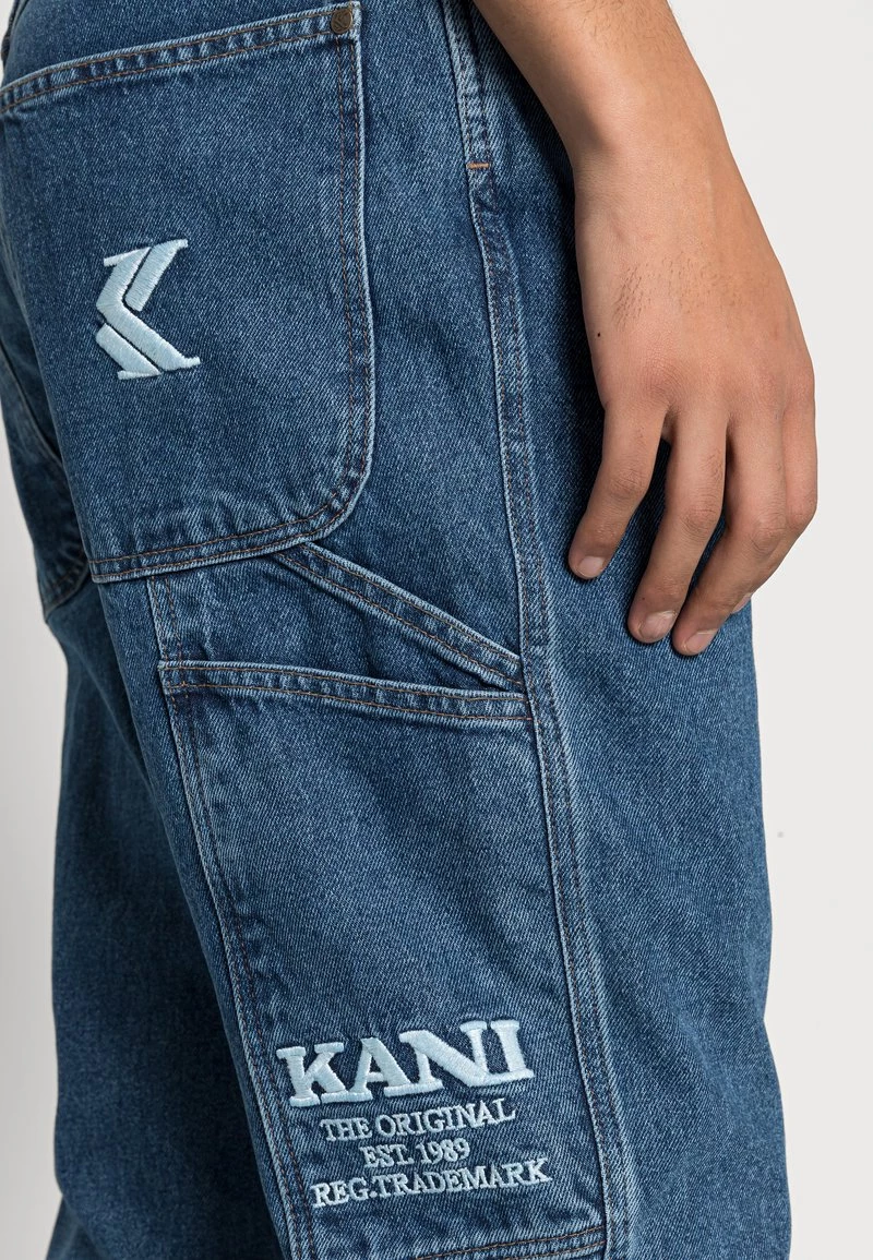 I primi 10 π Karl Kani RETRO WORKWEAR - π Jeans Tapered Fit - Dark Indigo, Uomo π 7 I primi 10 π Karl Kani RETRO WORKWEAR - π Jeans Tapered Fit - Dark Indigo, Uomo π - immagine 5