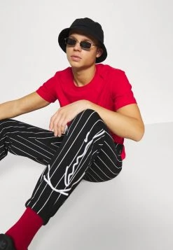 I primi 10 🎉 Karl Kani SIGNATURE PINSTRIPE PANTS UNISEX - Pantaloni Sportivi - Black 🥰 -Sconto Karl Kani in Italia 498089d5c0444545a6e7445af4e98e0f