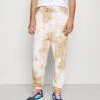 Sconto ✔️ Karl Kani SIGNATURE TIE DYE UNISEX - Pantaloni Sportivi - White 🌟 -Sconto Karl Kani in Italia 577e59acd4e5447da289885949536f42
