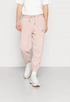 I primi 10 π Karl Kani SMALL SIGNATURE PANTS UNISEX - Pantaloni Sportivi - Rose π