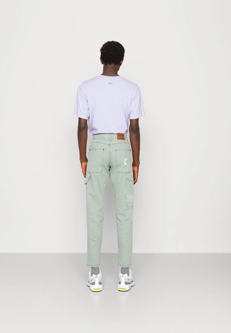 Buono π Karl Kani PANTS UNISEX - π Jeans Tapered Fit - Dark Mint π 5 Buono π Karl Kani PANTS UNISEX - π Jeans Tapered Fit - Dark Mint π - immagine 3
