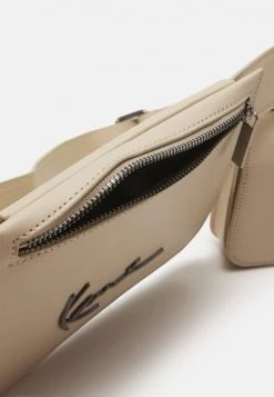Offerte 🔥 Karl Kani SIGNATURE MULTIPOCKET UNISEX - Marsupio - Cream 🛒 -Sconto Karl Kani in Italia 686184e740ed437aab43794b58768c42