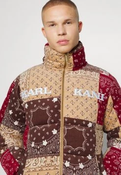 A buon mercato 🎁 Karl Kani RETRO PUFFER JACKET UNISEX - Giacca Invernale - Sand 👍 -Sconto Karl Kani in Italia 6b44f672944e421ebef6b9df0c41ff2a
