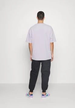 Vendita calda 🥰 Karl Kani SMALL SIGNATURE QUILTED PANTS UNISEX - Pantaloni - Black 💯 -Sconto Karl Kani in Italia 6c744fdf8dc741f78f5d314ab707d09c