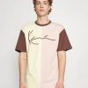 Nuovo 🧨 Karl Kani UNISEX SIGNATURE BLOCK TEE - T-shirt Con Stampa - Light Yellow ❤️ -Sconto Karl Kani in Italia 7f5f114744d641f4a3fe90b637d0530b