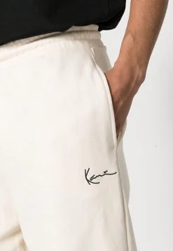 Promo ⌛ Karl Kani SMALL SIGNATURE UNISEX - Pantaloni Sportivi - Cream 😍 -Sconto Karl Kani in Italia 800b2a8a1b7f4c8d80ea3dbcc17290cb