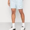 Miglior prezzo ⭐ KARL KANI X SMILEY® SIGNATURE RESORT - Shorts - Bleached Blue, Uomo 😉 -Sconto Karl Kani in Italia 8b182709d6834a869ffd9fb0e535f9e3