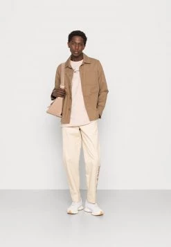 Migliore vendita 🌟 Karl Kani SIGNATURE TEE UNISEX - T-shirt Basic - Taupe ⭐ -Sconto Karl Kani in Italia 96f4b438c8ab4a01872c12343e15b306