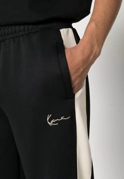 Vendita all'ingrosso 🔥 Karl Kani SMALL SIGNATURE TRACKPANTS - Pantaloni Sportivi - Black, Uomo 😀 -Sconto Karl Kani in Italia a14f2f49ad394289816fb52990b4623f