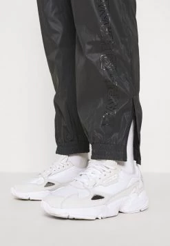 Offerte 🛒 Karl Kani RETRO REFLECTIVE TRACKPANTS - Pantaloni Sportivi - Black, Donna 🤩 -Sconto Karl Kani in Italia a18317cf760c44ba9222422c3c1d6737