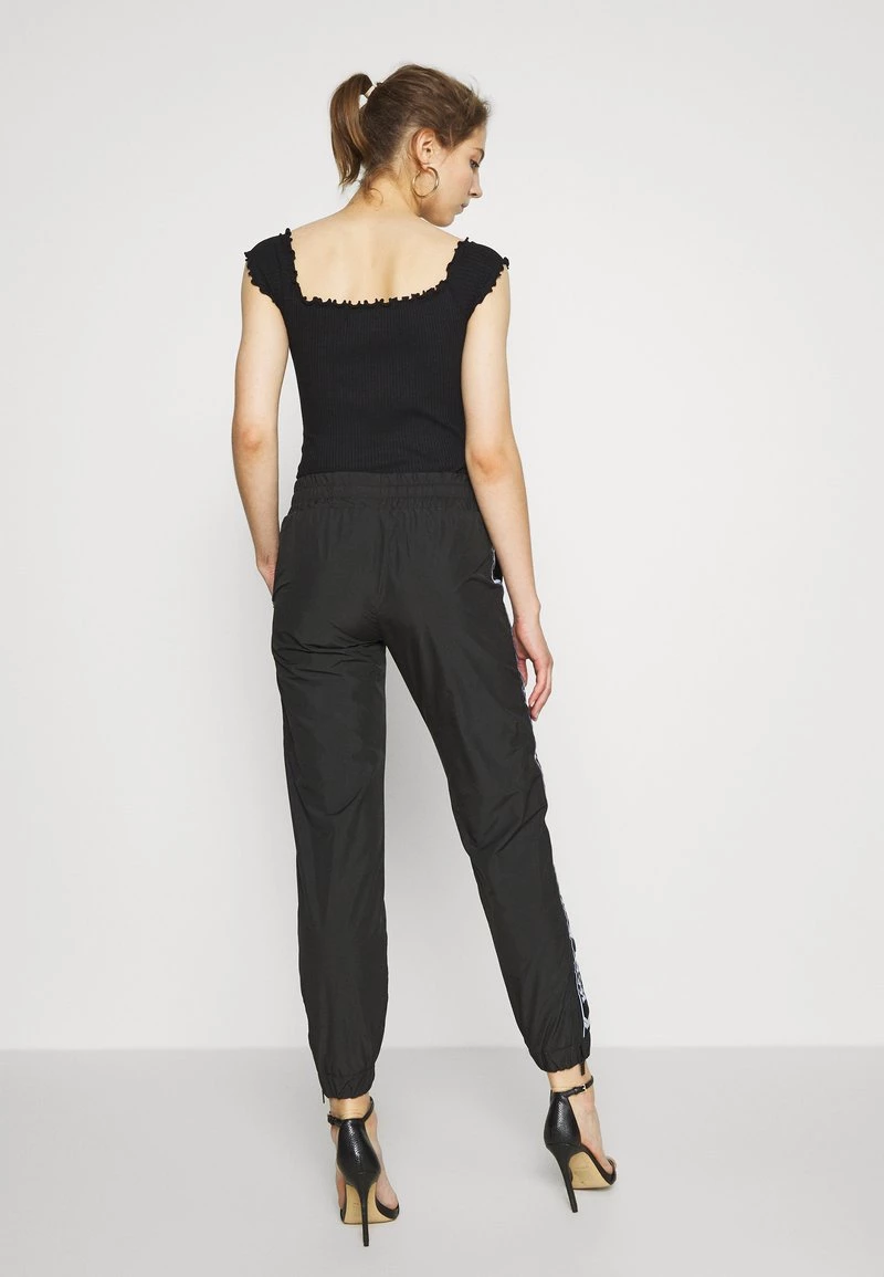 Miglior prezzo ✨ Karl Kani TRACKPANTS - Pantaloni Sportivi - Black, Donna ⌛ 5 Miglior prezzo ✨ Karl Kani TRACKPANTS - Pantaloni Sportivi - Black, Donna ⌛ - immagine 3