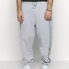 I primi 10 🤩 Karl Kani SIGNATURE RETRO - Pantaloni Sportivi - Grey/black, Uomo 🤩