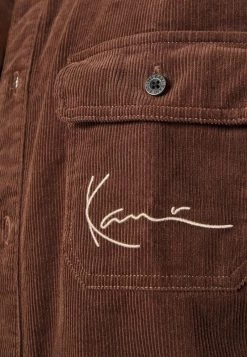 Offerte 🎉 Karl Kani CHEST SIGNATURE 👕 SHIRT UNISEX - Giacca Da Mezza Stagione - Brown ✨ -Sconto Karl Kani in Italia bd7faf1911e040128280cd3143b55010