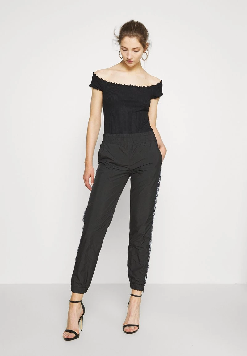 Miglior prezzo ✨ Karl Kani TRACKPANTS - Pantaloni Sportivi - Black, Donna ⌛ 4 Miglior prezzo ✨ Karl Kani TRACKPANTS - Pantaloni Sportivi - Black, Donna ⌛ - immagine 2