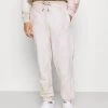 Offerte 😀 Karl Kani SIGNATURE TIE DYE UNISEX - Pantaloni Sportivi - Light Sand 🧨 -Sconto Karl Kani in Italia ec4753f08a50427484963e01f6d4c9dc