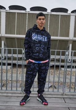 Presa 😉 KARL KANI X SMILEY® SIGNATURE REGULAR FIT UNISEX - Pantaloni Sportivi - Black 🌟