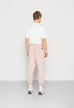 I primi 10 🔔 Karl Kani SMALL SIGNATURE PANTS UNISEX - Pantaloni Sportivi - Rose 🛒 -Sconto Karl Kani in Italia f1e6405e23274d42a64a574112b6649f