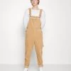 Sconto 👍 Karl Kani RETRO DUNGAREE UNISEX - Pantaloni - Sand 🌟 -Sconto Karl Kani in Italia f68fcfdc67c543d98f93380af0cffa4e
