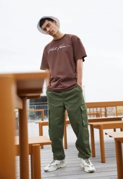 Vendita calda 🛒 Karl Kani AUTOGRAPH TEE UNISEX - T-shirt Basic - Brown 😍